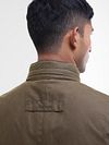 Barbour Manteau Ciré Corbridge Marron Model / Achterkant