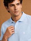 King Essentials The Rene Polo Bleu Clair Model / Voorkant