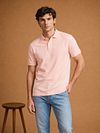 King Essentials The Rene Poloshirt Lichtroze Model / Voorkant