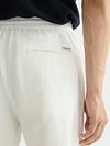 Szorty Scotch and Soda Fave z bawełny i lnu w kolorze ecru Model / Detail