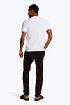 T-Shirt Tommy Hilfiger con logo Monotype en blanco Model / Achterkant