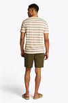 Tommy Hilfiger T-Shirt w paski beżowy Model / Achterkant
