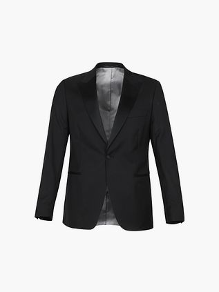 Passer Colbert'en fra New York i uld i sort