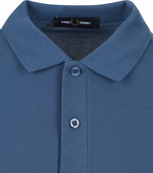 Fred Perry Polo'en i Plain Mid Blå er en klassiker, der aldrig går af mode. Dette blå Product / Detail