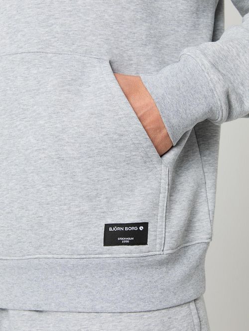 Bluza z kapturem Bjorn Borg Centre, szara Model / Detail