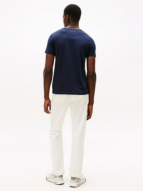 Tommy Hilfiger T-Shirt z logo Granatowy Model / Achterkant