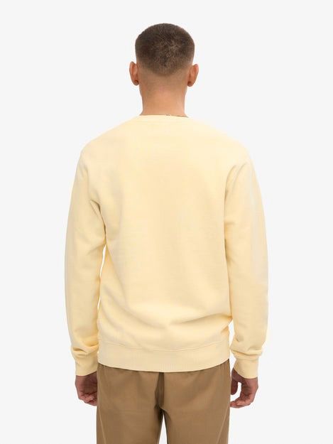 Sweter Colorful Standard w kolorze Soft Yellow Model / Achterkant
