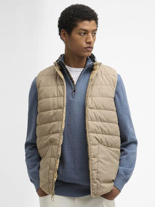Dwustronna kamizelka puchowa Barbour w kolorze beżowym Model / Voorkant