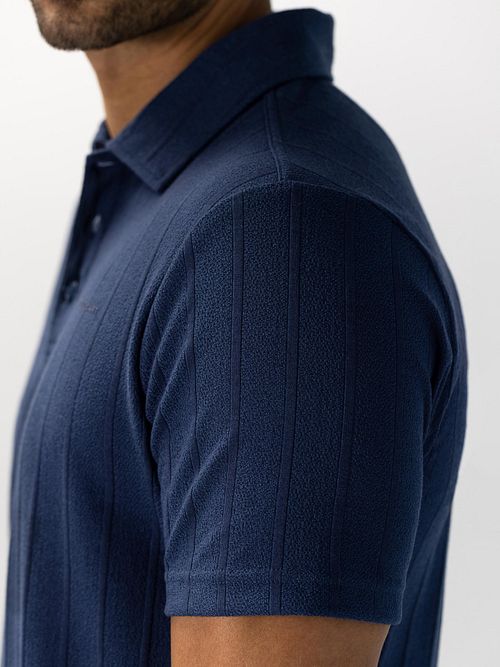State of Art Poloshirt Jersey Drop Needle Marineblå Model / Zijkant