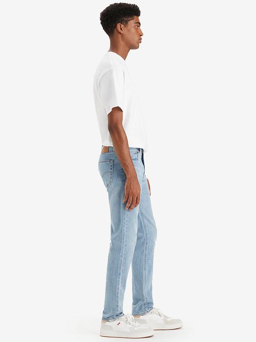 Jeansy Levi's 511 z denimu w kolorze mid grey Model / Zijkant