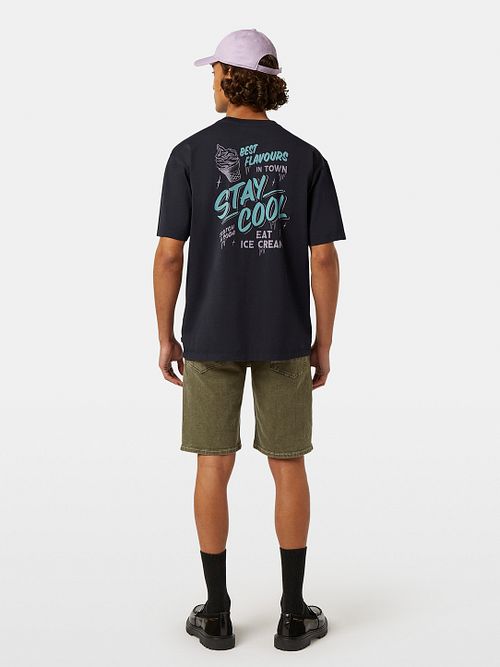 T-Shirt con gráfico Scotch & Soda en negro Model / Achterkant