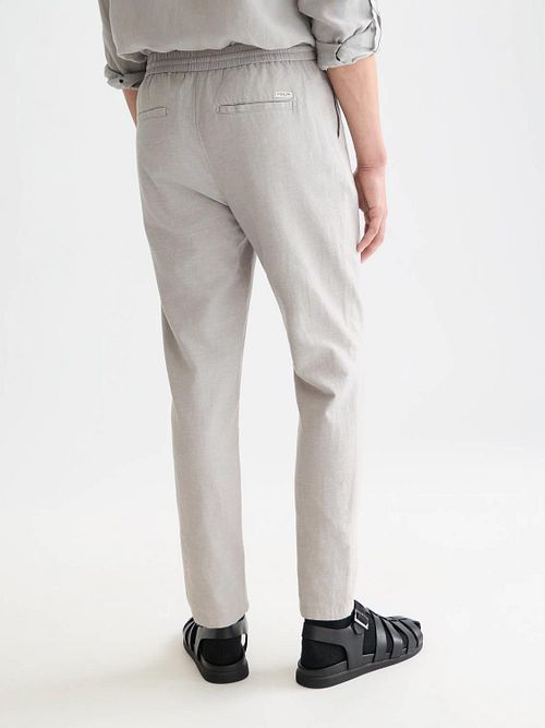 Chinosy Scotch and Soda Warren z bawełny i lnu w kolorze greige Model / Achterkant