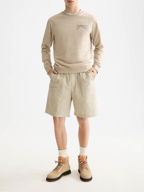 Sudadera Scotch and Soda con logo en beige Model / Voorkant