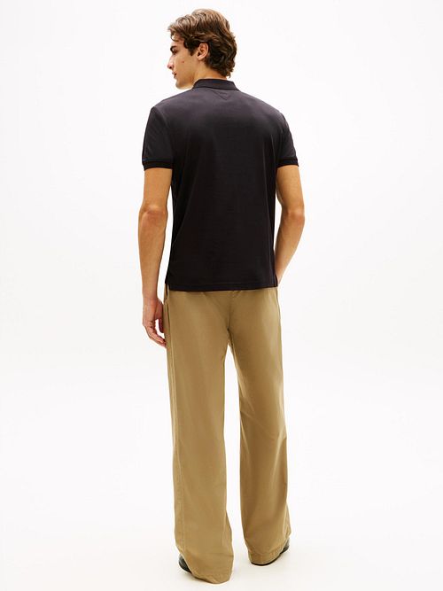 Tommy Hilfiger Half-Zip Polo Interlock Marinblå Model / Achterkant
