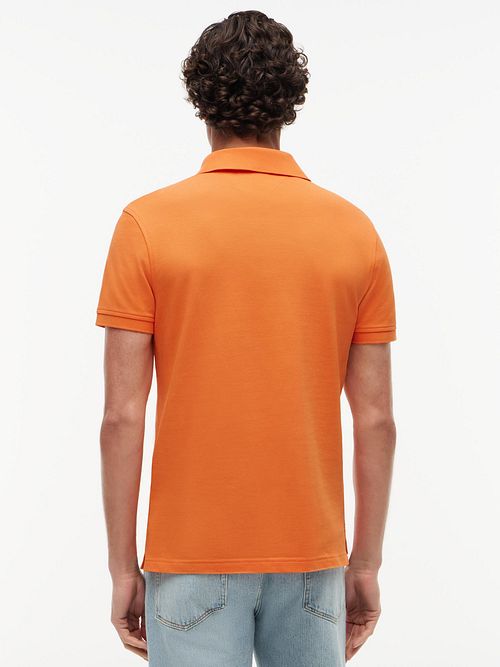 Tommy Hilfiger 1985 Polo shirt Orange Tulip Model / Achterkant