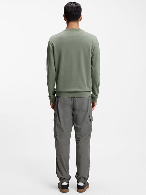 Sweter BOSS Westart w kolorze zielonym Model / Achterkant