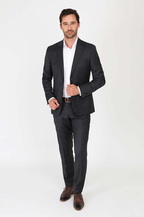Traje Suitable Toulon Serge Wool liso negro Model / Voorkant con Emiel