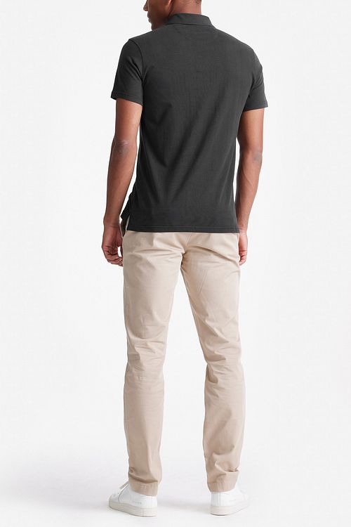 King Essentials The James Poloshirt Zwart Model / Achterkant